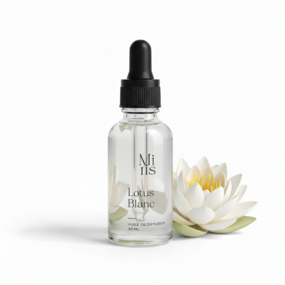 Flacon d'huile Lotus Blanc sur un fond blanc épuré.